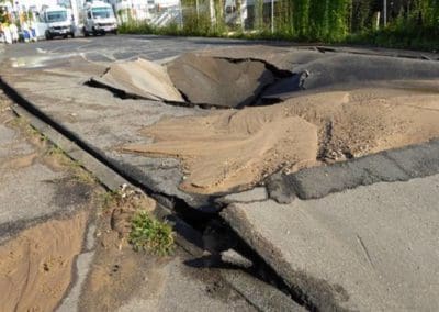 sinkhole at the road in need of septic service