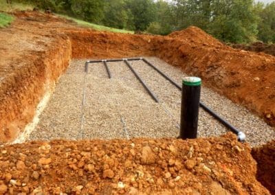 excavating and plumbing for a new septic tank installation